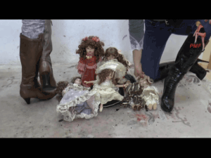 Expensive Dolls crushed under Boots
