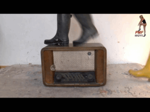 Old historical Radio crushed under merciless Boots 8