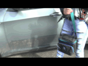 Reflex camera and flashlight under heavy BMW