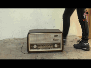 Old historical Radio crushed under merciless Sneakers 9