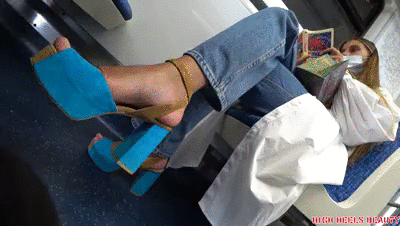 Blonde  BRAT  in blue high heel sandals