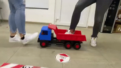 Two Girls Destroy Big Toy Truck