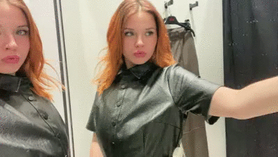 redhead goddess in leather dress